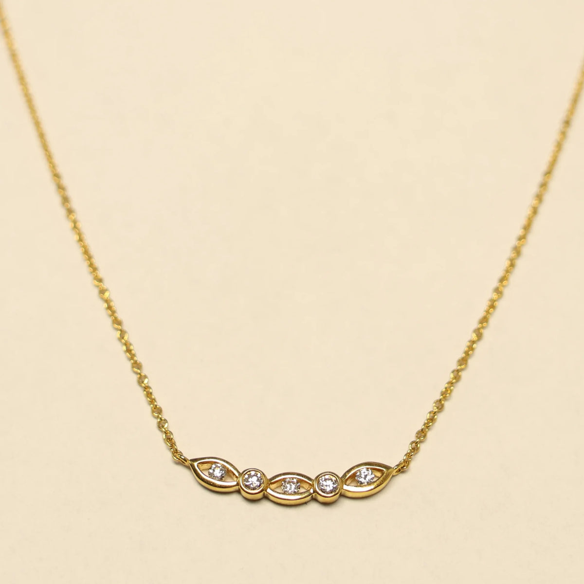Yellow gold chain brilliant eyes charm 063625A