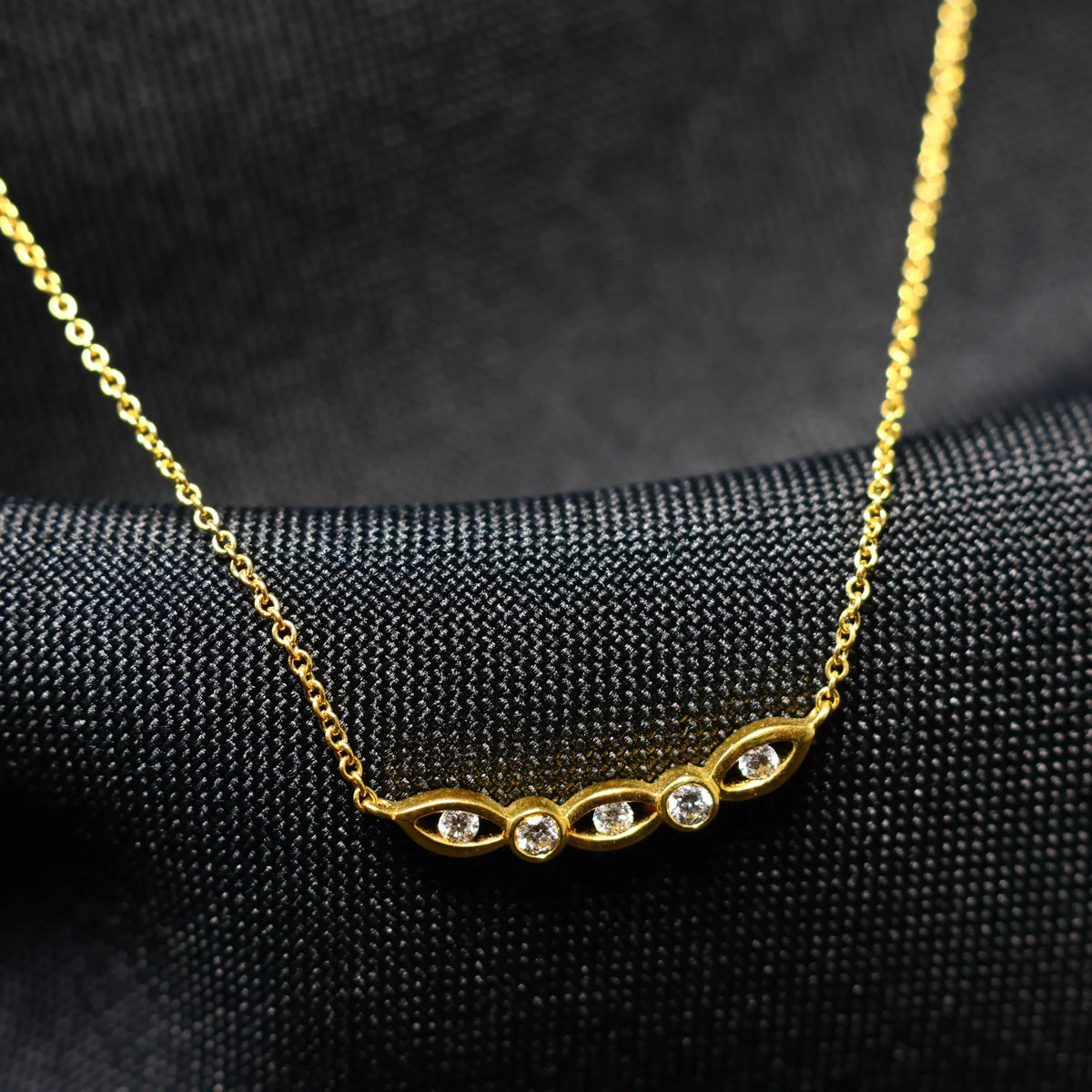Yellow gold chain brilliant eyes charm 063625A