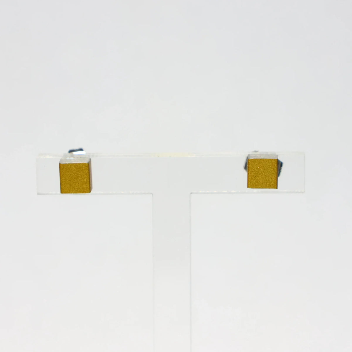CLIC earrings gold cube